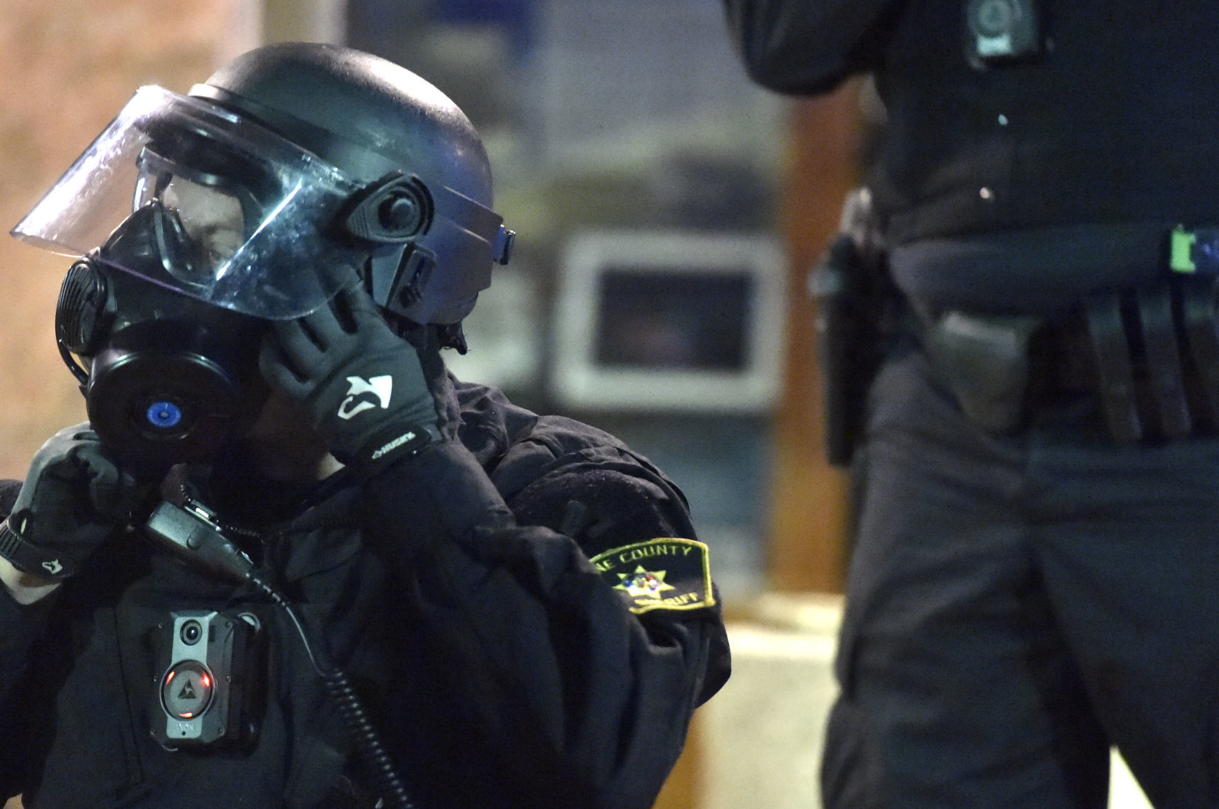 Donning a gas mask